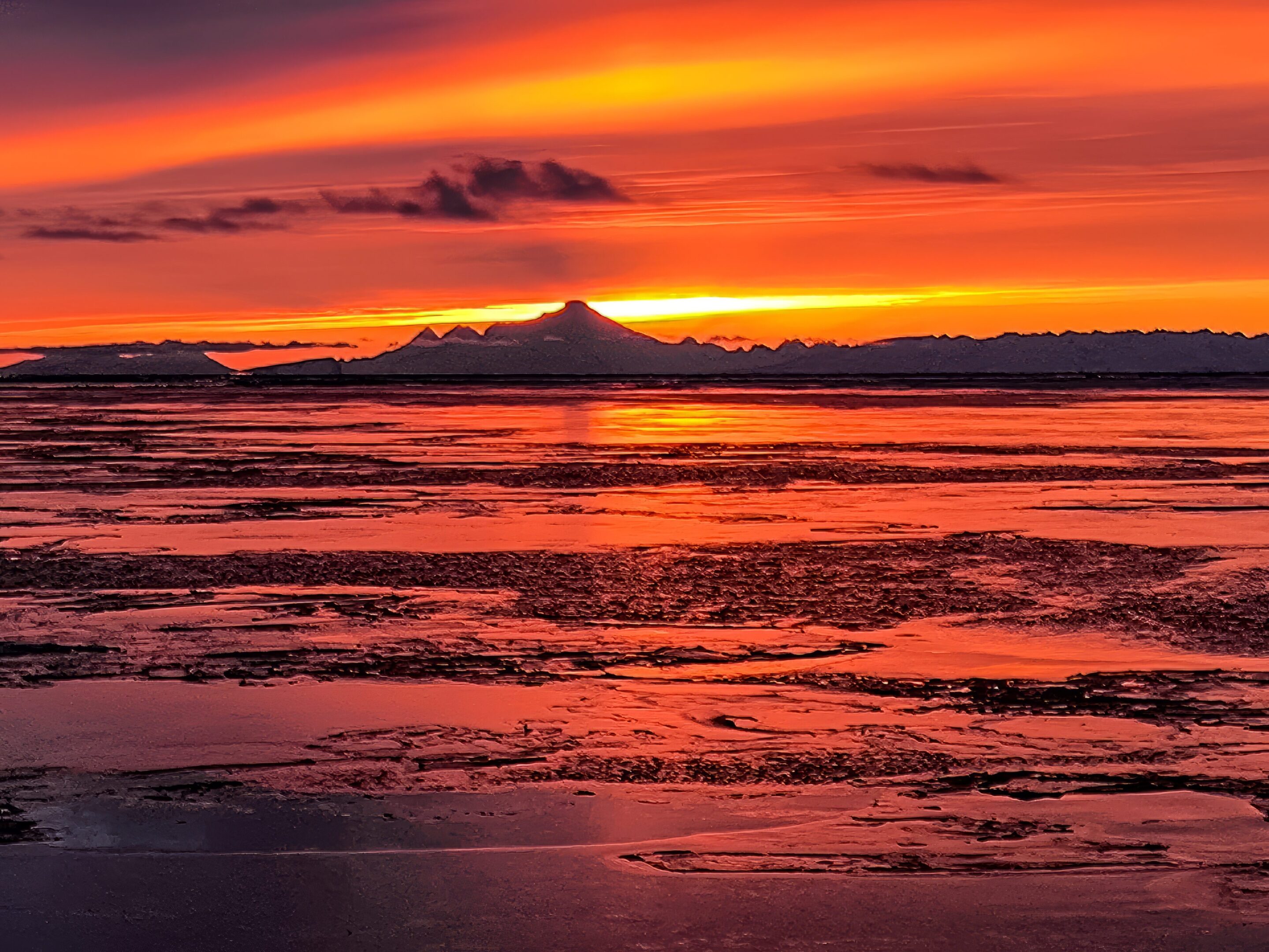 Vibrant sunset over icy landscape